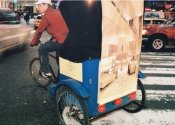 Photo: Pedicab with an ad for The World Bar.
